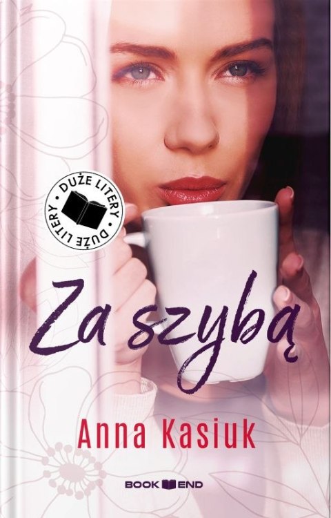 Za szybą. Duże litery